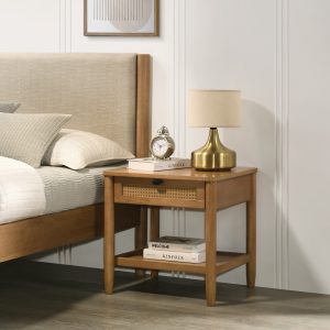 Walnut nightstand beside a bed with a lamp, clock, drawer, and open shelf